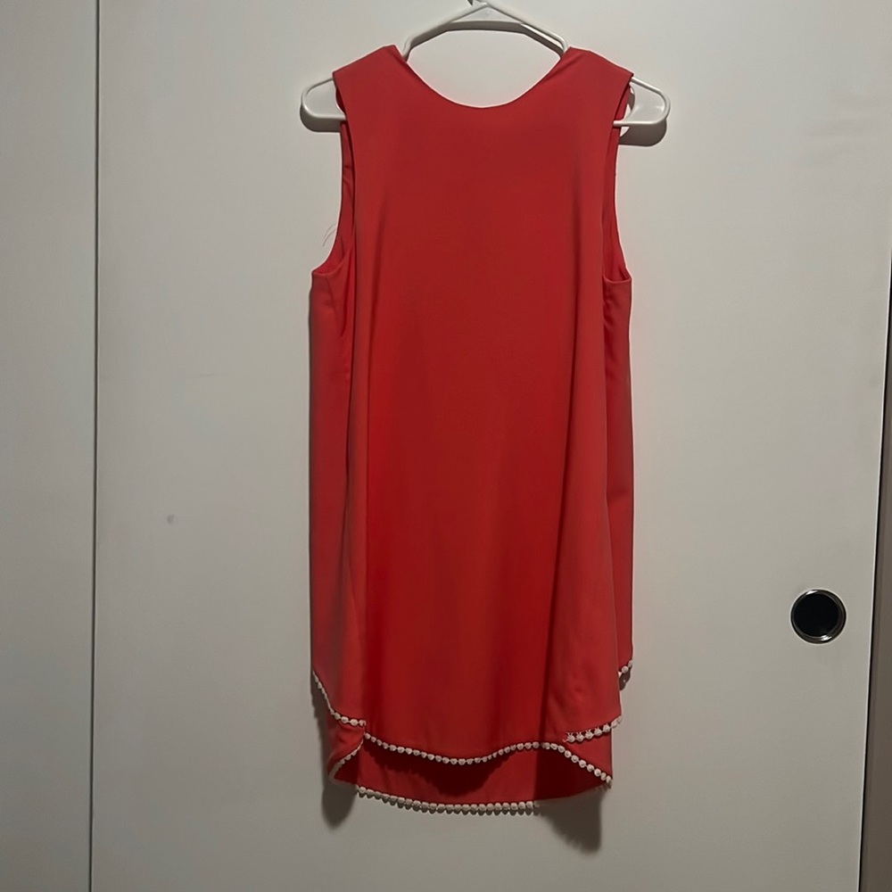 Coral shift dress with hidden open back